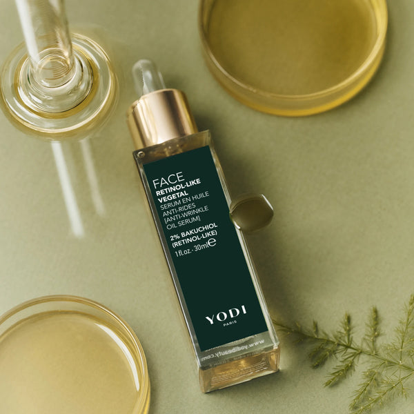 Sérum en huile Anti Rides Yodi au rétinol végétal (2 % bakuchiol), flacon posé parmi les huiles